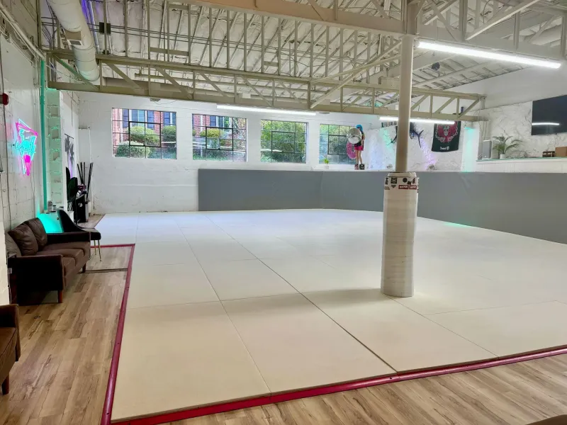 Entrance and front desk area at SuperFly BJJ Brazilian Jiu-Jitsu gym in Decatur