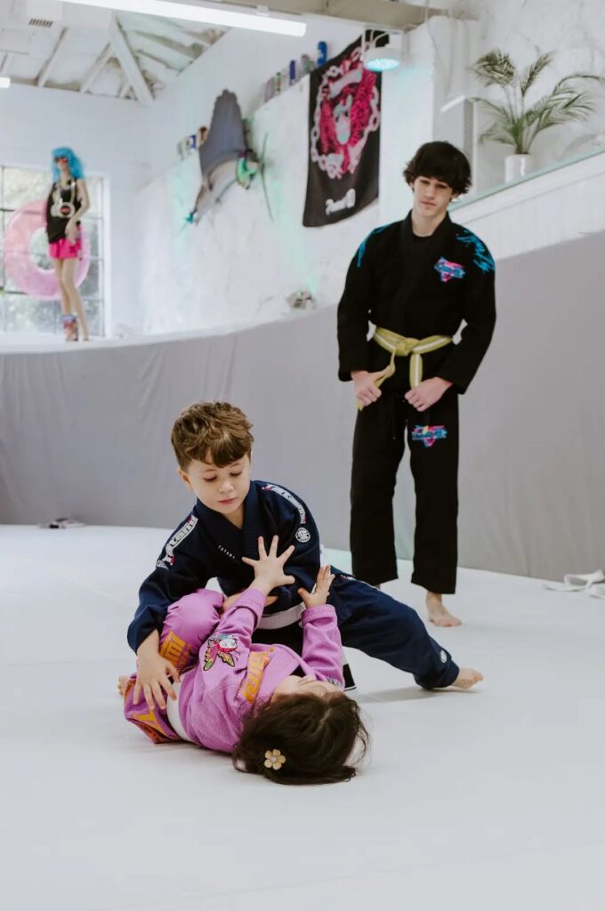 Kids gaining ultimate confidence through Brazilian Jiu-Jitsu.