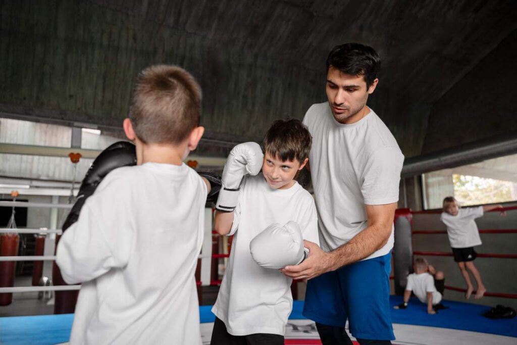 Kids enjoying Halloween-themed Brazilian Jiu-Jitsu class in Decatur.